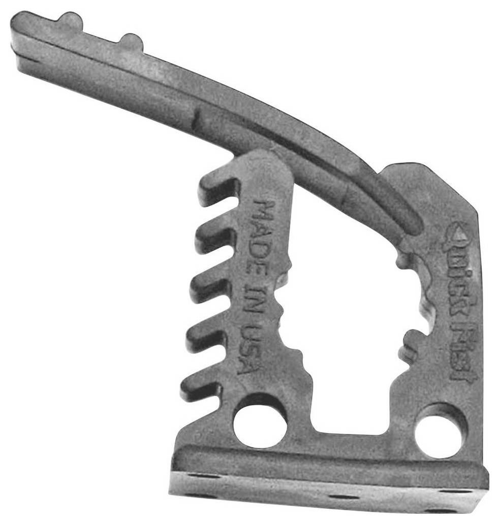 Ein Metallbauteil mit einer gekerbten Struktur, gekennzeichnet mit 'Made in USA'. Das Design umfasst gebogene und gerade Elemente, die offensichtlich für mechanische Zwecke vorgesehen sind.