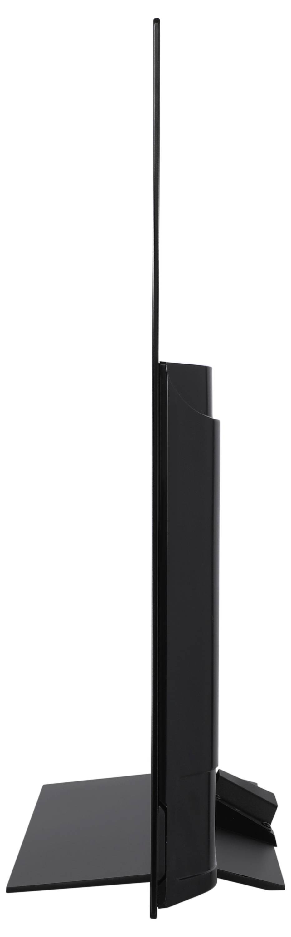 Eine Seitenansicht eines ultraflachen, modernen Flachbildschirm-Fernsehers, die sein schlankes Profil und sein elegantes Design vor einem neutralen Hintergrund hervorhebt.