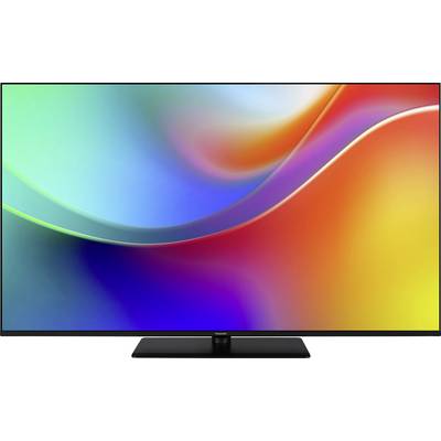 Ein Flachbildfernseher, der einen lebendigen Wirbel aus Farben zeigt, darunter Blau, Grün, Rot und Orange. Das Design ähnelt einem Farbverlauf.