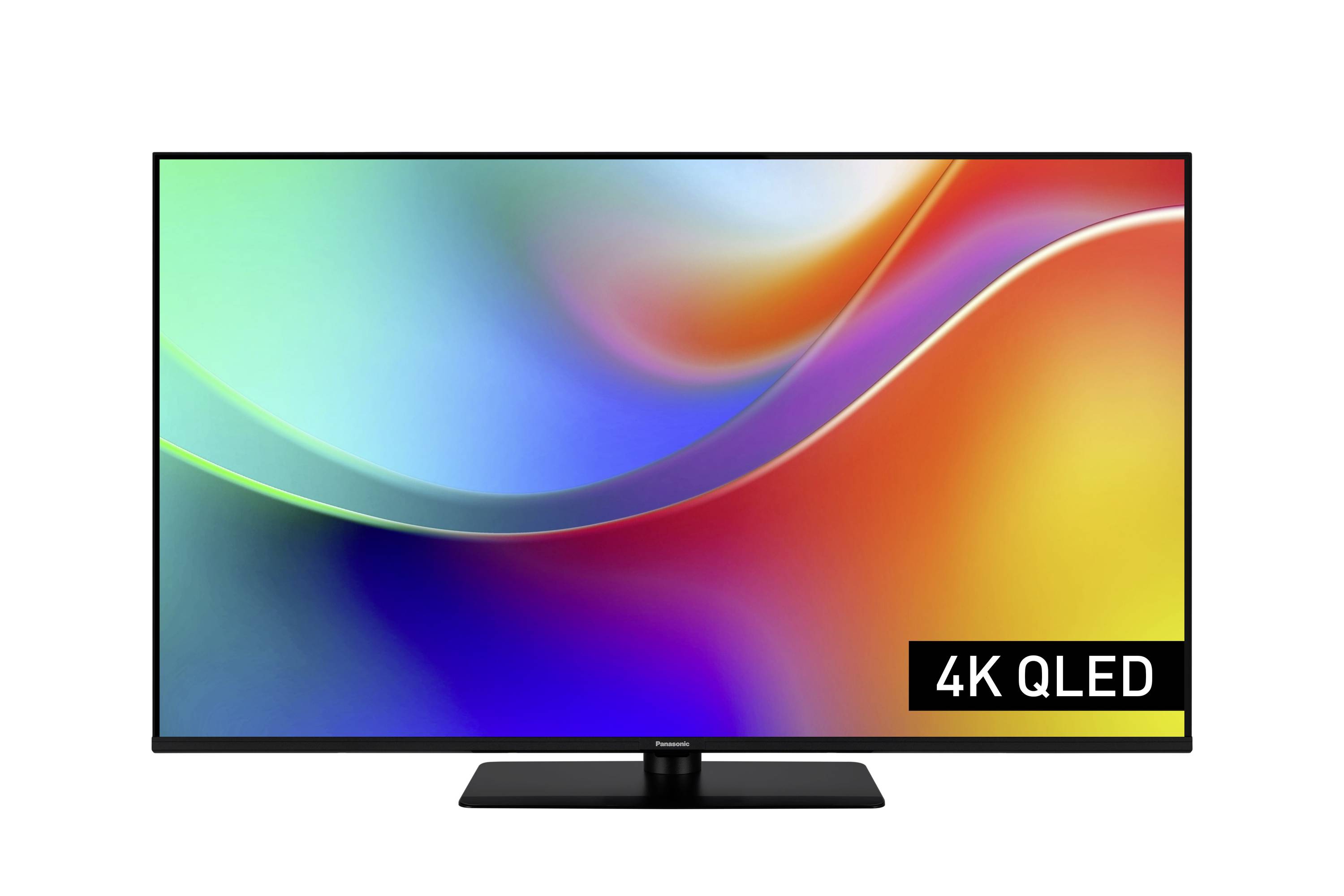 Ein Flachbildfernseher, der ein lebendiges abstraktes Muster zeigt, mit dem Text '4K QLED' in einer schwarzen Box in der unteren rechten Ecke.