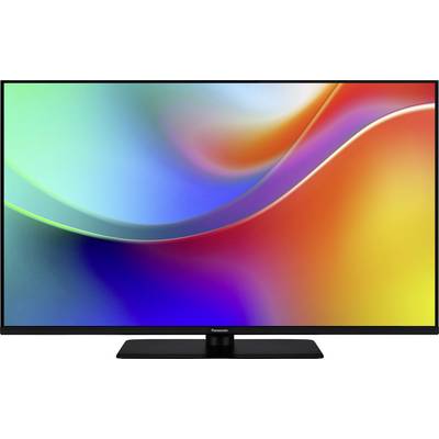 Ein schlanker moderner Fernseher mit einer lebendigen abstrakten, bunten Anzeige, die einen Farbverlauf von Blau-, Grün-, Rot- und Gelbtönen zeigt.