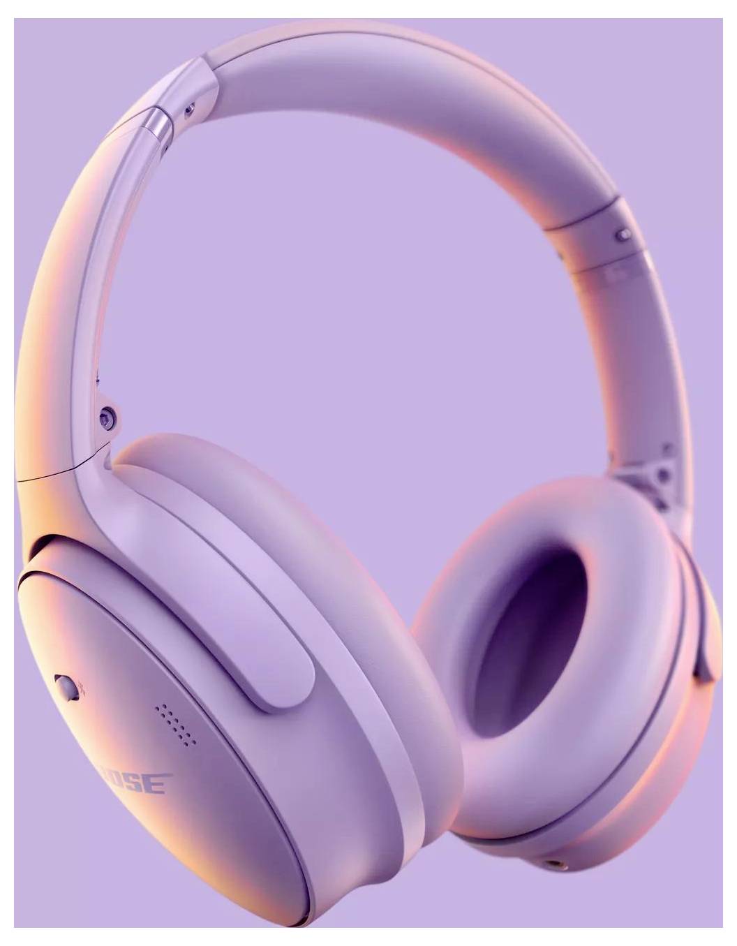 Ein Paar moderne Over-Ear-Kopfhörer mit weicher Polsterung, die auf einem lila Hintergrund dargestellt werden.