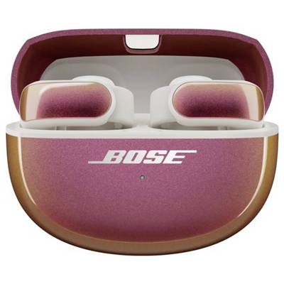Bose-Kopfhörer in einem rosa-goldenen Farbverlauf-Ladeetui, mit dem Logo auf dem Deckel des Etuis sichtbar.