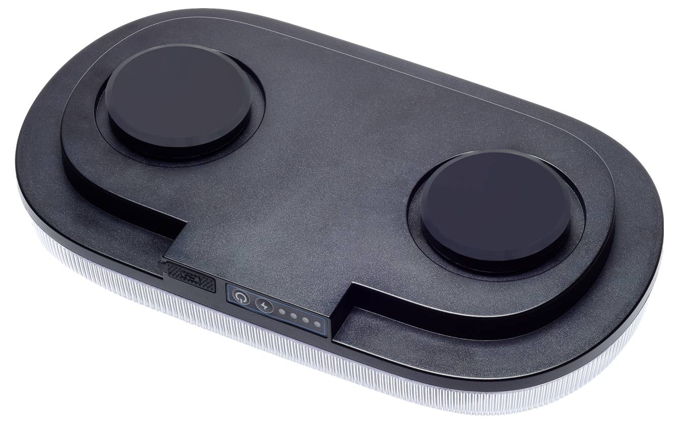 Eine schwarze Induktionskochplatte mit zwei kreisrunden Kochzonen und Bedienungstasten in der Mitte, konzipiert für kompaktes und effizientes Kochen.