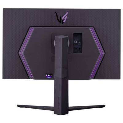 Rückansicht eines großen Gaming-Monitors mit hexagonaler Designstruktur und violetten LED-Akzenten. Ausgestattet mit mehreren Anschlüssen für Konnektivität.