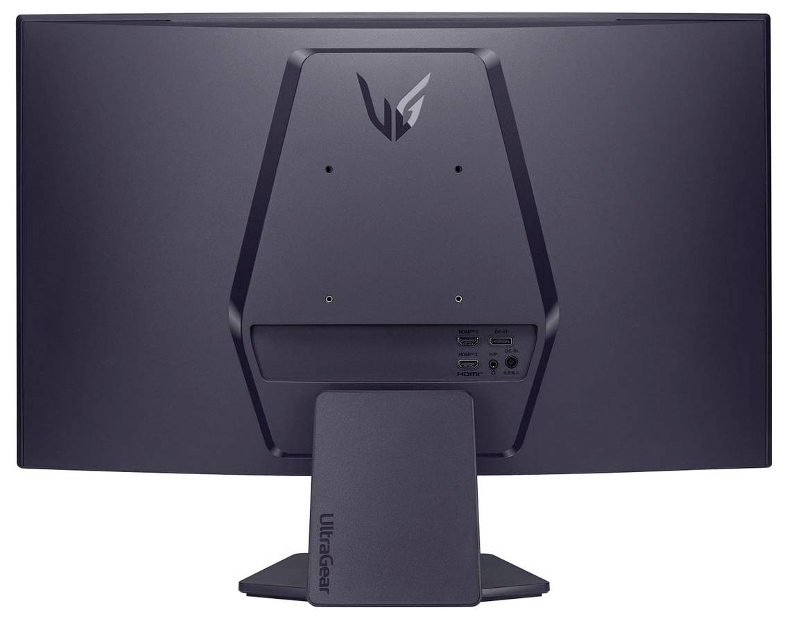 Ein schwarzer Computermonitor, von hinten betrachtet, mit hexagonaler Designstruktur, einem Ständer mit der Aufschrift 'UltraGear' und Anschlüssen auf der Rückseite.