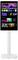 Ein digitaler Bildschirm zeigt eine Benutzeroberfläche mit mehreren Streaming-Service-Symbolen und Film-Miniaturansichten, montiert auf einem hohen weißen Ständer.