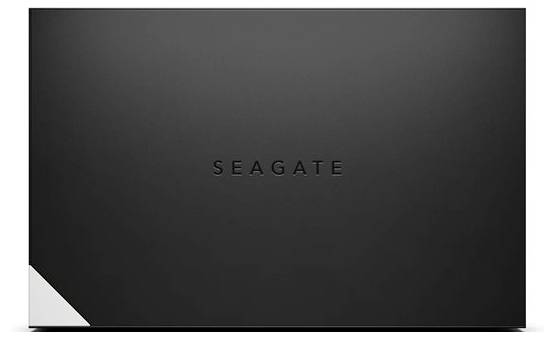 Eine schwarze externe Festplatte von Seagate mit minimalistischem Design und einem kleinen weißen Dreiecksakzent in der linken unteren Ecke.