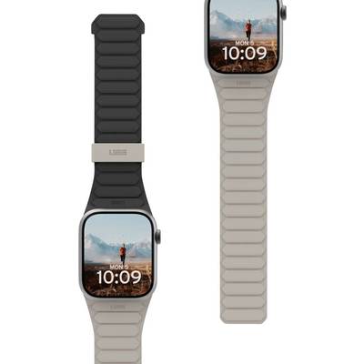 Zwei Smartwatches mit sechseckigen Bandmustern; eine in Schwarz und eine in Beige. Beide zeigen eine Berglandschaft auf ihren Bildschirmen mit der Anzeige 'MON, 5 10:09'.