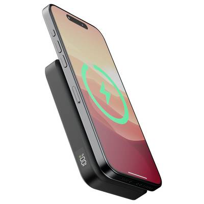 Smartphone mit Verlaufsbildschirm auf einem drahtlosen Ladegerät, auf dem ein Ladeicon angezeigt wird.