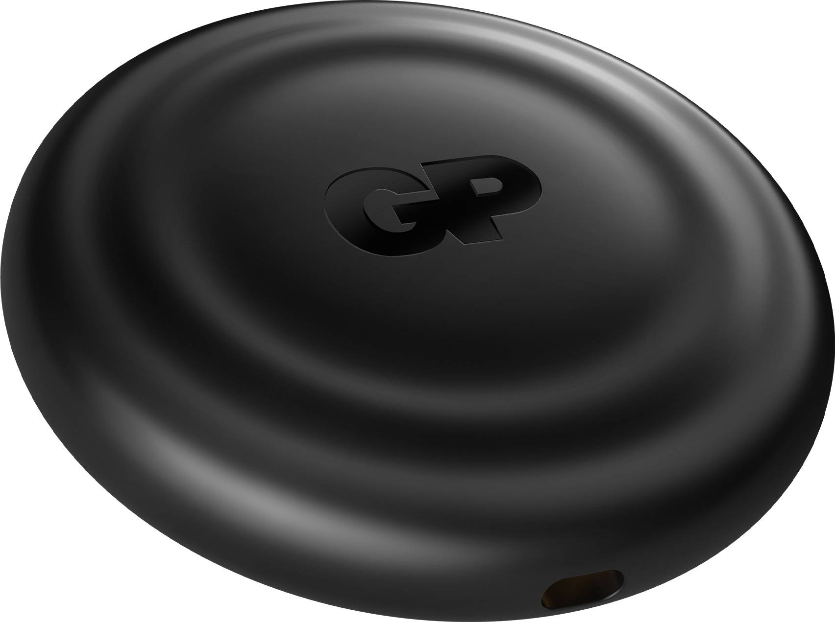 Ein Foto eines schwarzen drahtlosen Ladegeräts mit den Initialen GP, die oben eingraviert sind.