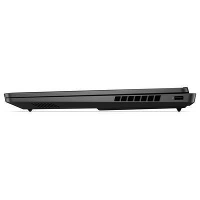 Seitenansicht eines geschlossenen schwarzen Laptops mit Lüftungsschlitzen und einem USB-Anschluss an der Seite, der auf einer ebenen Oberfläche liegt.