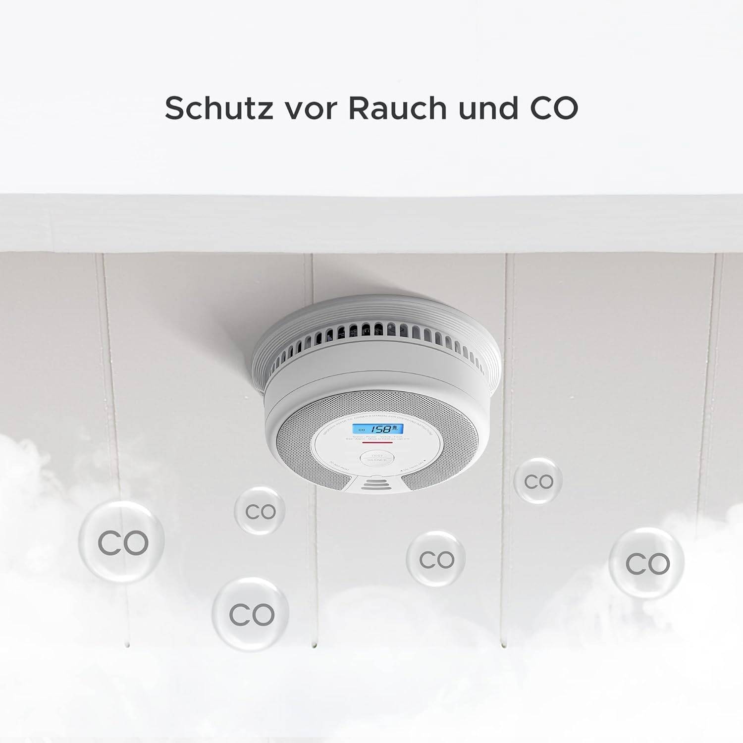 Ein Rauch- und CO-Melder ist an der Decke montiert. Auf dem digitalen Display ist eine blaue Anzeige. Text darüber: 'Schutz vor Rauch und CO'.