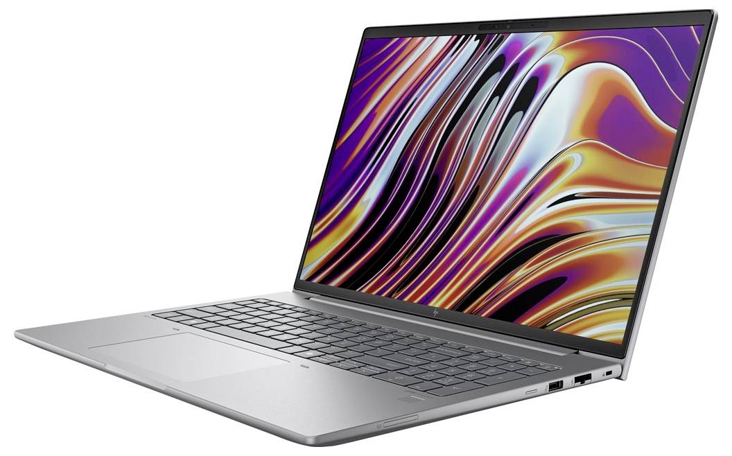 Ein schlanker silberner Laptop ist geöffnet und zeigt ein farbenfrohes abstraktes Muster auf seinem Bildschirm, ausgestattet mit einer kompakten Tastatur und dünnem Design.