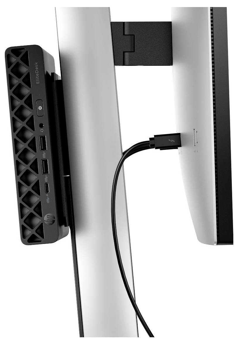 Ein Computermonitorständer mit einer montierten Dockingstation, die mehrere USB-Anschlüsse besitzt und ein angeschlossenes schwarzes Kabel aufweist.