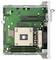 Eine grüne Computer-Motherboard mit verschiedenen Komponenten, einschließlich einer zentralen Verarbeitungseinheit (CPU) mit einem Kühlventilator, RAM-Steckplätzen und Anschlüssen.