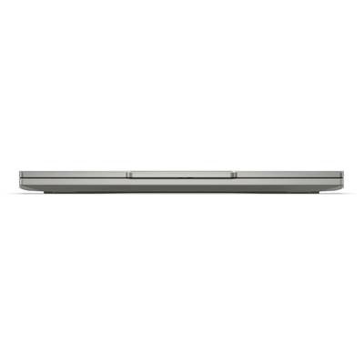 Ein vintager, geschlossener, grauer Laptop mit minimalistischem Design und zentraler Scharnier auf einem schlichten Hintergrund.