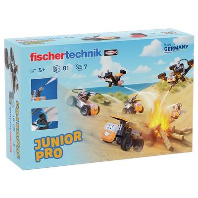 Eine Spielzeugbausatz-Schachtel mit 'fischertechnik Junior Pro', die baubare Spielzeugfahrzeuge um eine Lagerfeuerszene zeigt. Geeignet für Kinder ab 5 Jahren.