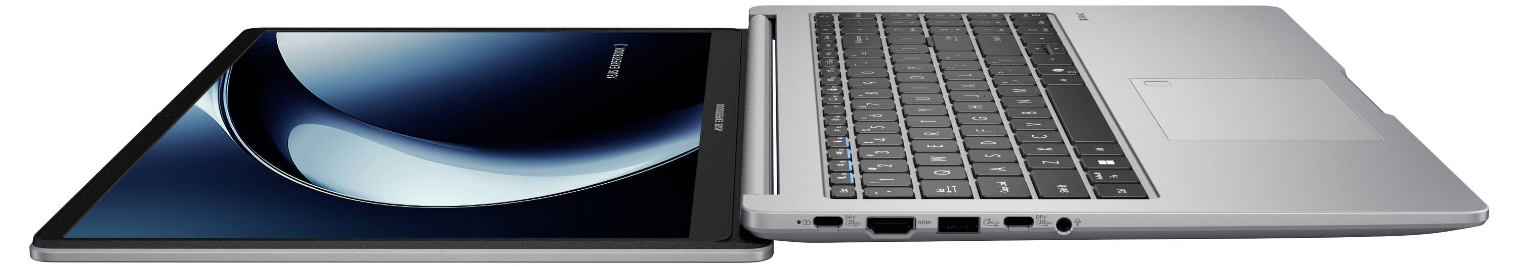 Ein silberner Laptop und ein silbernes Tablet werden nebeneinander gezeigt, wobei das Tablet einen blauen und schwarzen Bildschirm anzeigt.