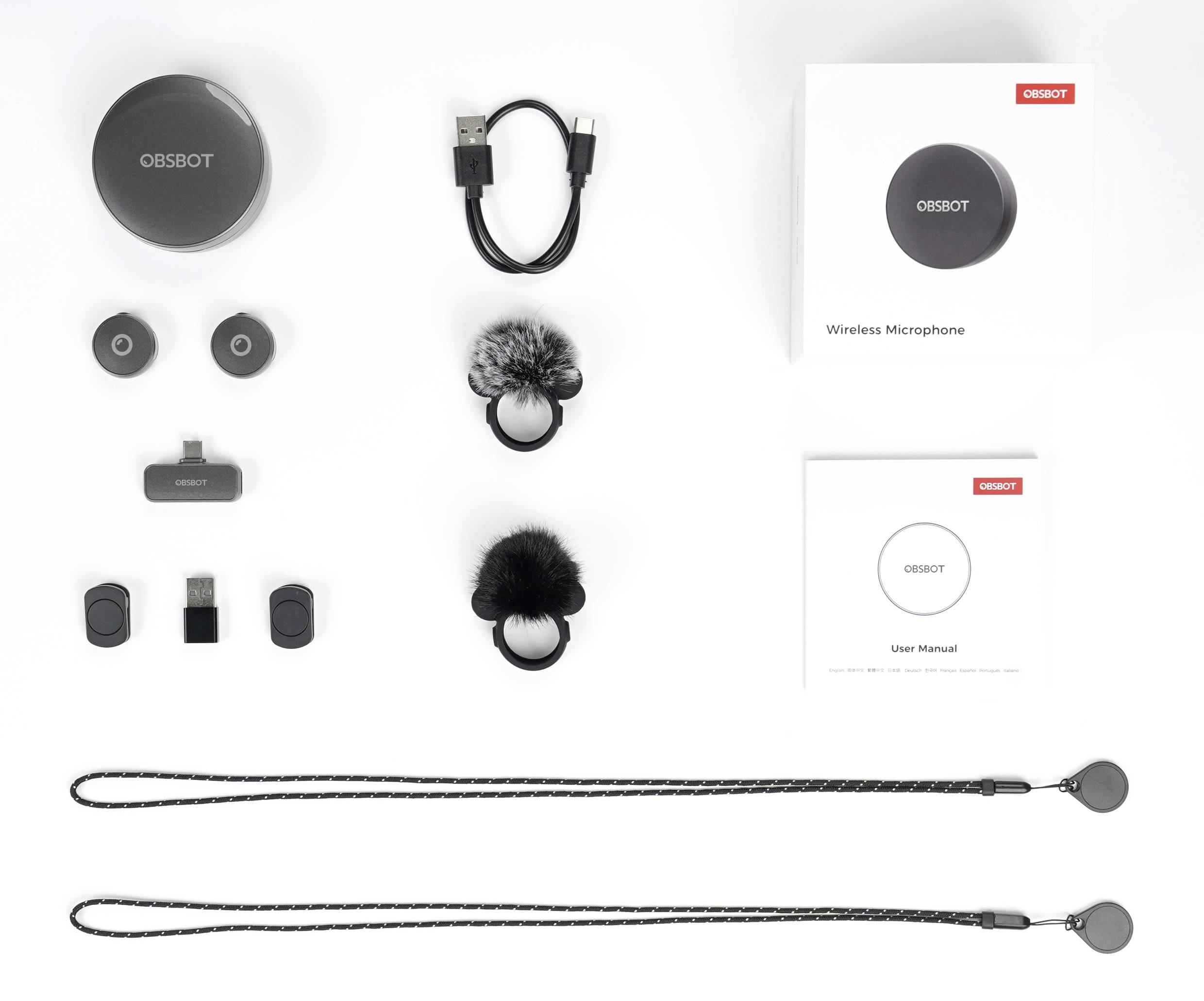 OBSBOT drahtloses Mikrofon-Set, bestehend aus Mikrofon, Kabeln, Schaumstoff- und Fellwindschutz, Anschlüssen, Riemen und Bedienungsanleitung.
