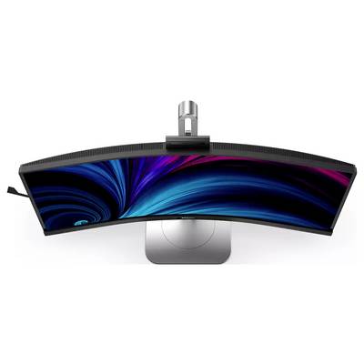 Gekrümmter Monitor von oben betrachtet, der ein dynamisches Blau- und Rosa-Wirbelmuster auf dem Bildschirm zeigt.