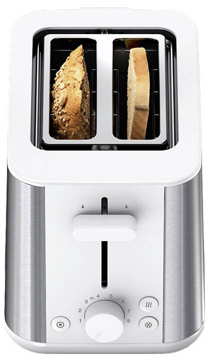 Ein silber-weißer Toaster mit zwei Scheiben Brot; eine ist Vollkornbrot, die andere ist Weißbrot. Der Toaster verfügt über einen Bräunungsregler.