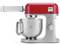 Ein roter und silberner Standmixer mit einer Edelstahlschüssel, mit der Aufschrift 'Kenwood kMix', konzipiert für die Lebensmittelzubereitung.