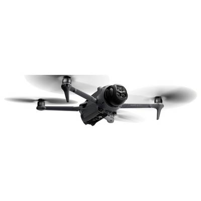 Eine schwarze Quadcopter-Drohne mit vier Propellern in Flugposition, mit einer Kamera, die vorne angebracht ist.