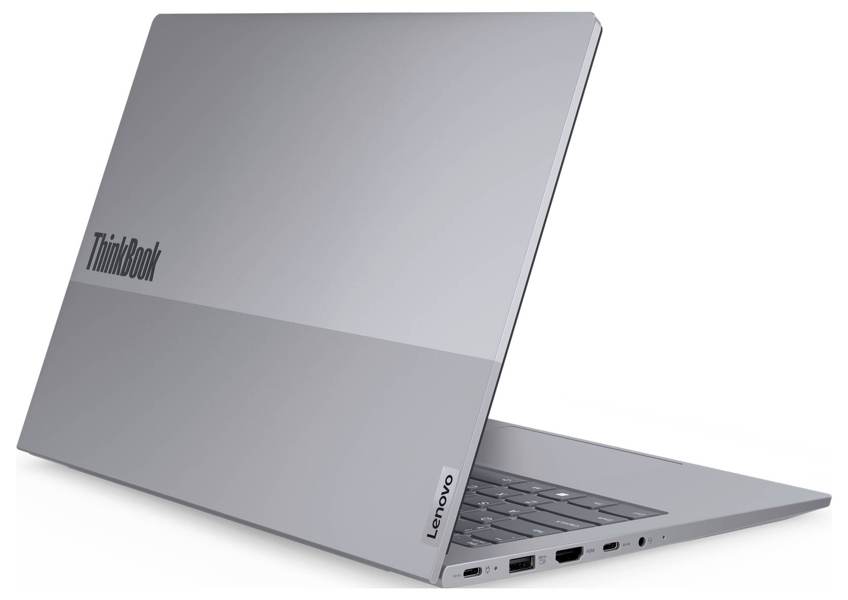 Geschlossener silberner Laptop mit den Logos 'ThinkBook' und 'Lenovo' auf dem Deckel, mit sichtbaren Anschlüssen an der Seitenkante.