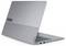 Geschlossener silberner Laptop mit den Logos 'ThinkBook' und 'Lenovo' auf dem Deckel, mit sichtbaren Anschlüssen an der Seitenkante.