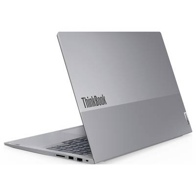 Ein schlankes silbernes Laptop, halb geöffnet, zeigt die Tastatur und den Bildschirmrand. Das Logo "ThinkBook" ist prominent auf dem Deckel platziert.