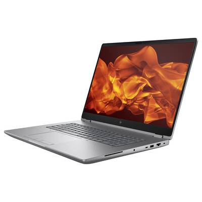 Ein silberner Laptop mit einem lebhaften orange-roten abstrakten Flammendesign auf dem Bildschirm.