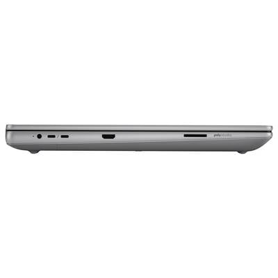 Seitenansicht eines geschlossenen silbernen Laptops mit Anschlüssen für Netzteil, USB-C, HDMI, USB-A und einen microSD-Kartensteckplatz.