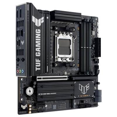 Gaming-Mainboard mit schwarz-silbernem Design, das mehrere Steckplätze für RAM und Erweiterungskarten aufweist. Branding lautet 'TUF GAMING'.