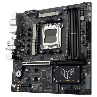 Eine Computermotherboard mit mehreren Anschlüssen, RAM-Steckplätzen, einem PCIe-Steckplatz und einem CPU-Sockel, von ASUS als 'TUF Gaming' gekennzeichnet.