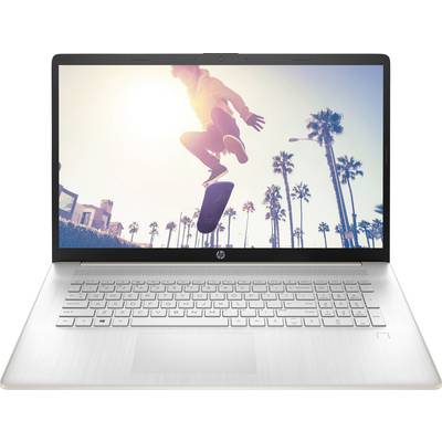 Ein Laptop, der ein Video oder Bild einer Person zeigt, die mitten in der Luft auf einem Skateboard schwebt, vor einer Kulisse von Palmen und hellem Sonnenschein.