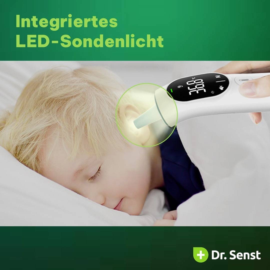 Ein Kind schläft friedlich, während ein Thermometer mit integriertem LED-Licht zur Messung verwendet wird.