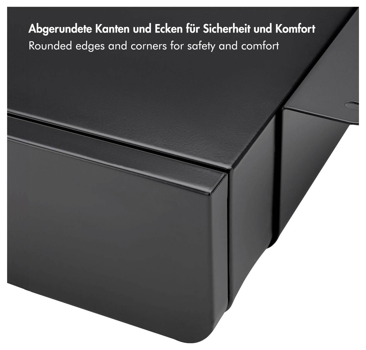 'Glänzender schwarzer Gegenstand mit abgerundeten Kanten für Sicherheit und Komfort, der ein glattes Design betont.'