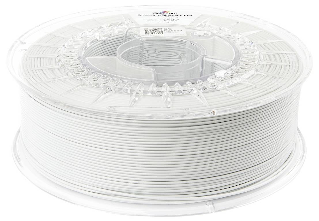 Eine transparente Spule weißes 3D-Druckerfilament, mit der Aufschrift "Spectrum Filaments", geeignet für verschiedene Druckprojekte.