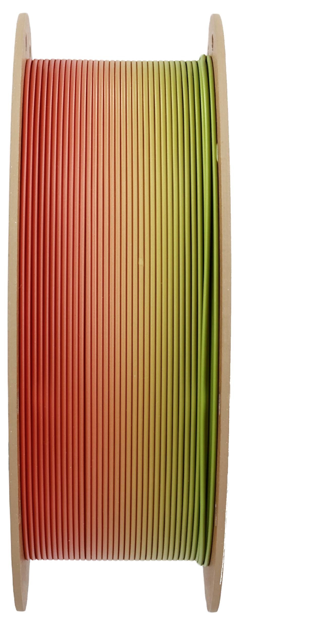 Eine Spule Filament mit einem Farbverlauf vom Rot zum Grün zum 3D-Drucken.