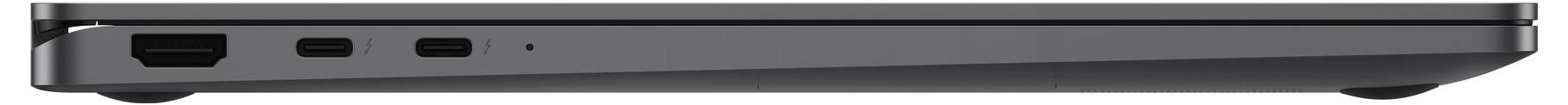 Ein geschlossener Laptop von der Seite, der Anschlüsse und ein schlankes Profil zeigt.