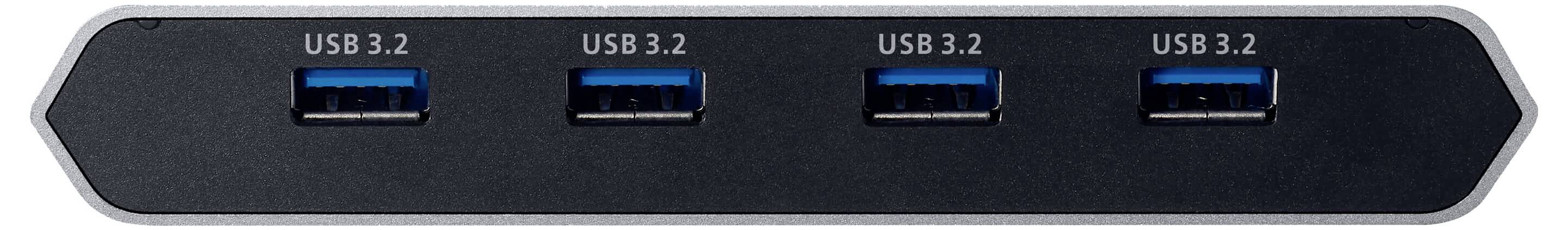 Ein schwarzer USB-Hub mit vier USB-3.2-Anschlüssen, die jeweils in blau umrandet sind und in einer Reihe angeordnet sind.