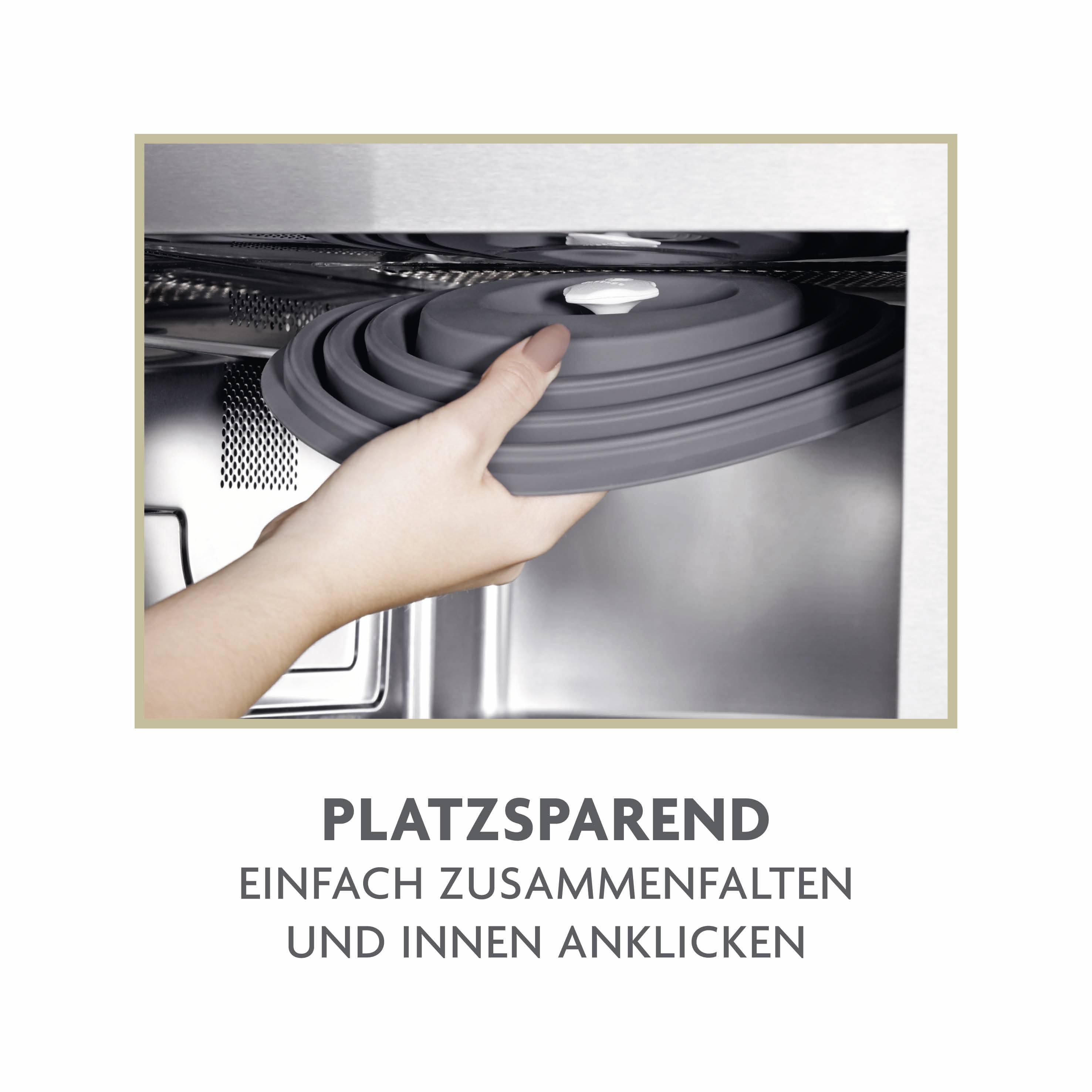 Eine Hand faltet einen grauen Silikon-Topfdeckel zusammen und steckt ihn in eine Spülmaschine. Text: 'PLATZSPAREND, EINFACH ZUSAMMENFALTEN UND INNEN ANKLICKEN'.