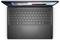 Draufsicht eines geöffneten Laptops mit einer schwarzen Tastatur und einem Bildschirm, auf dem eine Webseite mit Text und Bildern angezeigt wird.