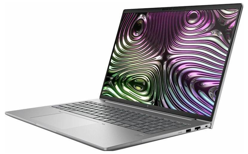 Ein schlankes silbernes Laptop mit einem bunten, gewellten abstrakten Muster auf dem Bildschirm, das in einem Winkel vor einem weißen Hintergrund präsentiert wird.