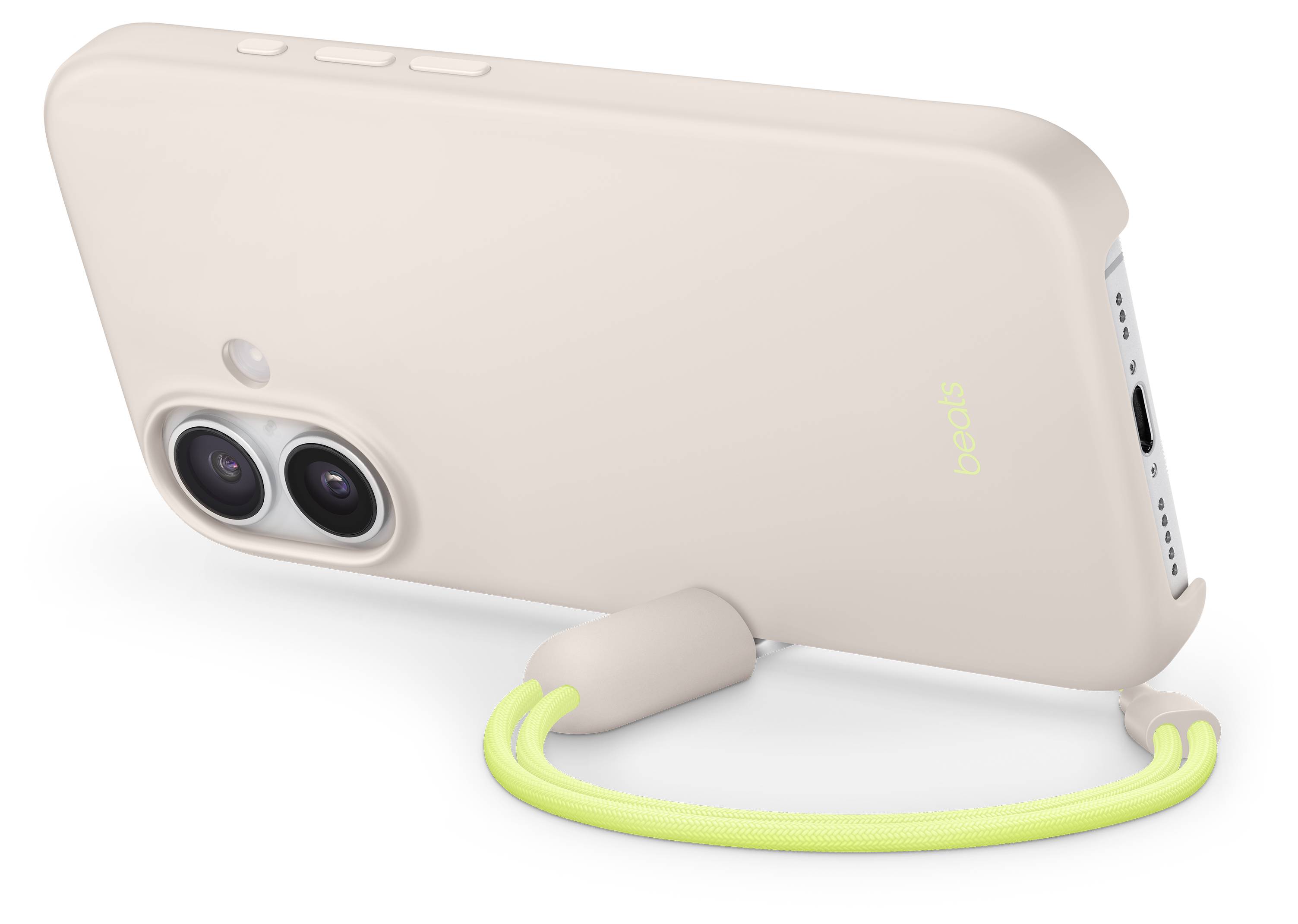 Ein Telefon auf einem Ständer mit einer beigen Hülle, Dual-Objektiv-Kamera und neongrünem Riemen. Das Telefon ist horizontal positioniert.