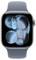 Eine Smartwatch mit einem grauen Armband und einem digitalen Display, das abstrakte blaue Formen auf einem schwarzen Hintergrund zeigt.