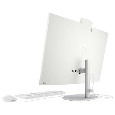 Ein weißes Computersetup mit einem All-in-One-Desktop, von hinten betrachtet, mit sichtbaren Anschlüssen. Dazu gehören eine passende Tastatur und Maus seitlich daneben.