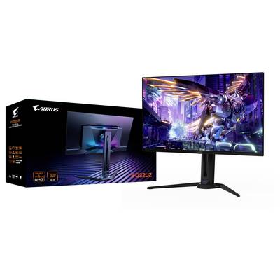 Gaming-Monitor mit futuristischer Stadtlandschaft auf dem Bildschirm. Karton daneben zeigt Produktmarke und Eigenschaften und hebt 4K-Auflösung und 32-Zoll-Größe hervor.