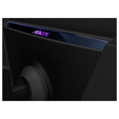 Das Bild zeigt die Rückansicht eines schwarzen Monitors, auf dessen oberer Kante das beleuchtete Logo 'AORUS' zu sehen ist, was auf einen Fokus auf Gaming hindeutet.
